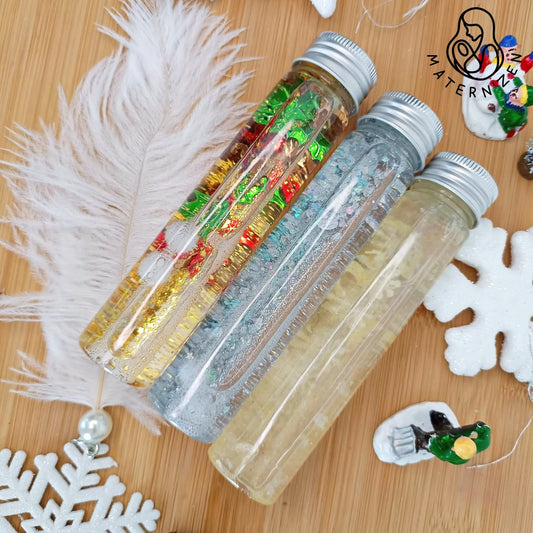 Acheter bouteilles sensorielles Montessori liquides flottantes  pour le retour au calme et l'observation sur le thème de Noël. 